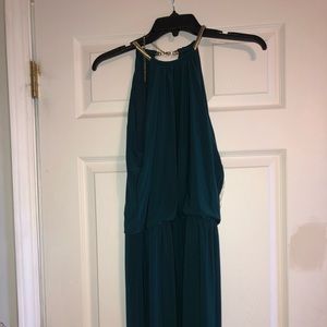 Dark teal dress. Halter neck.
